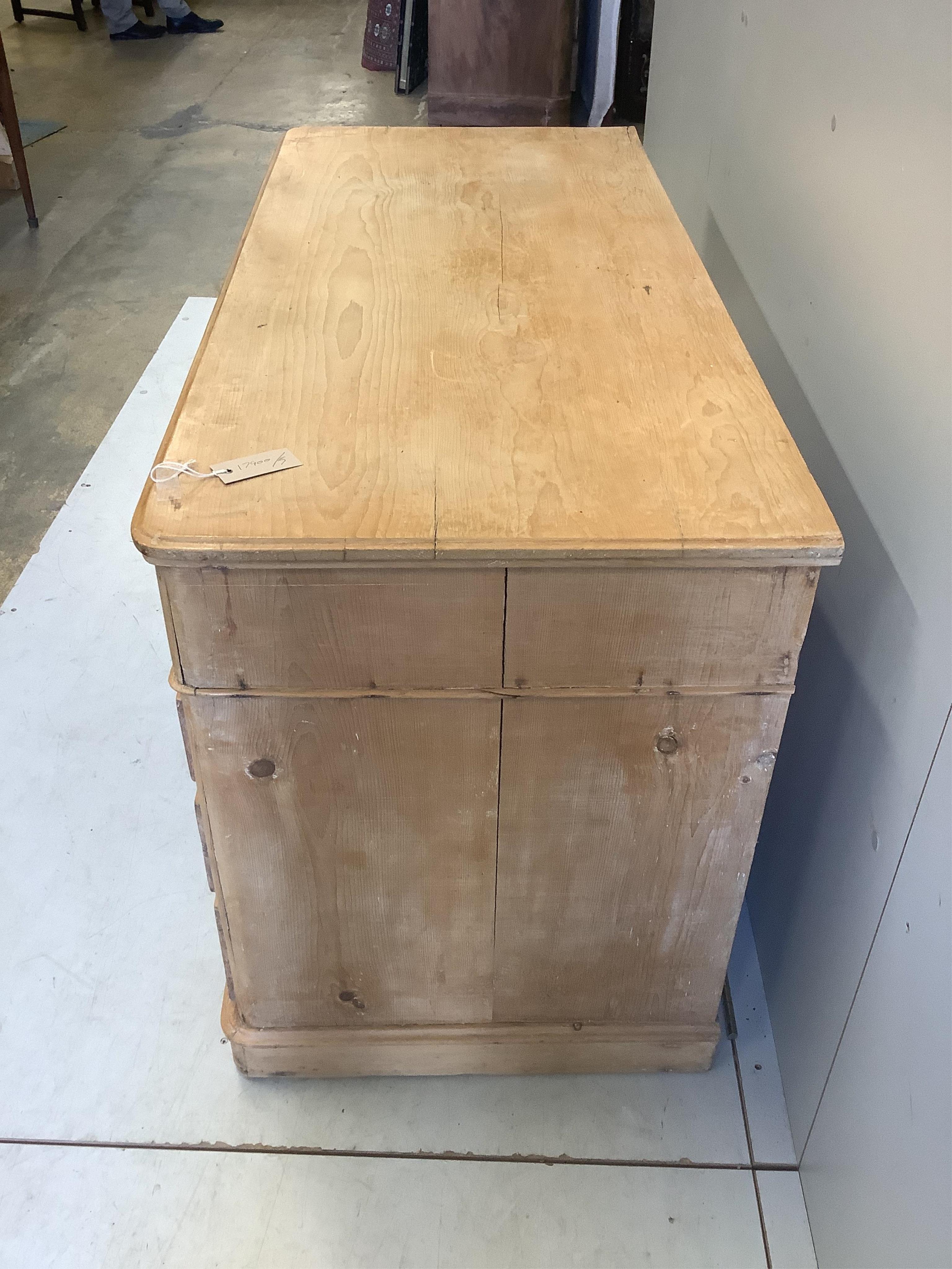 A Victorian pine kneehole dressing table, width 121cm, depth 55cm, height 73cm. Condition - fair